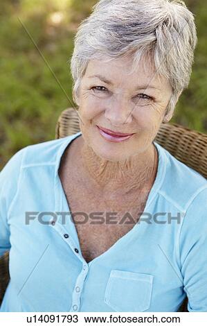 Stock Image - Portrait of senior woman. Fotosearch