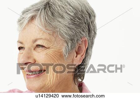 Stock Image - Portrait of senior woman. Fotosearch