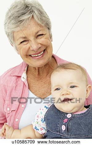 Portrait of senior woman with baby View Large Photo Image Stock Photo - Portrait of senior woman with baby. Fotosearch