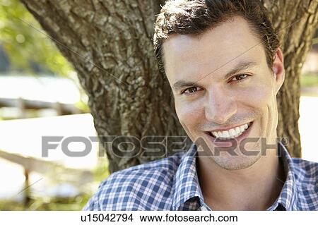 Picture - Portrait of young man. Fotosearch