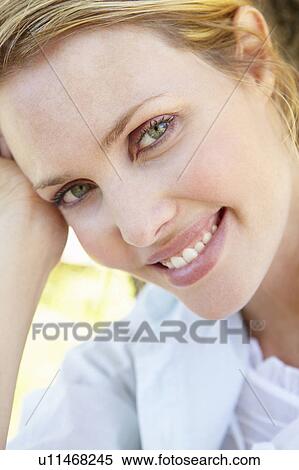 Stock Photography - Portrait of young woman. Fotosearch