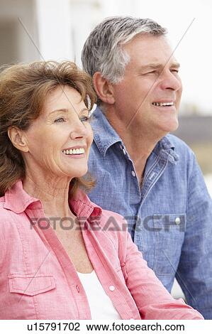 Stock Image - Portrait senior couple outdoors. Fotosearch