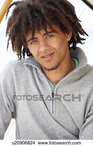 Picture - Portrait teenage boy outdoors. Fotosearch