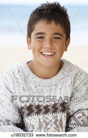 Stock Image - Portrait teenage boy outdoors. Fotosearch