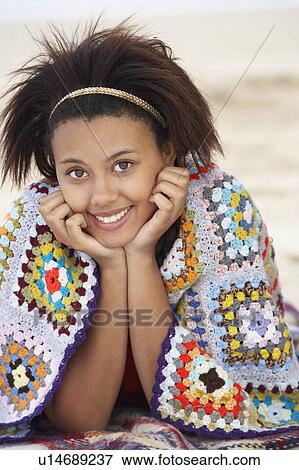 Stock Photo - Portrait teenage girl on beach. Fotosearch