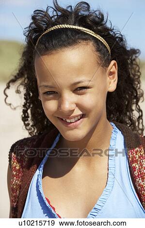 Stock Photo - Portrait teenage girl outdoors. Fotosearch