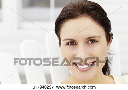 Stock Photo - Portrait woman outdoors. Fotosearch