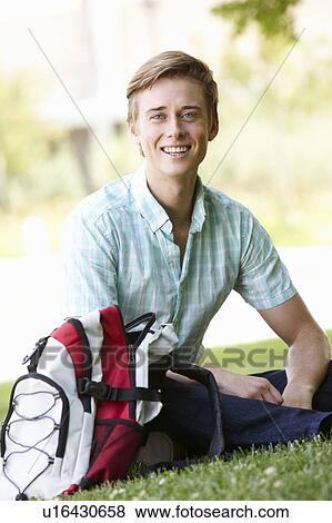 Stock Photo - Portrait young man outdoors. Fotosearch