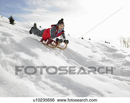 Pre-teen Boy On A Sled In The Snow View Large Photo Image Stock Photograph - Pre-teen Boy On A Sled In The Snow. Fotosearch