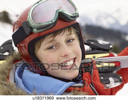 Stock Photo - Pre-teen Boy On Ski Vacation. Fotosearch