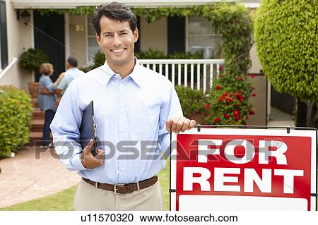 Real estate agent at work View Large Photo Image Stock Image - Real estate agent at work. Fotosearch