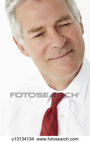 Picture - Senior businessman head and shoulders. Fotosearch
