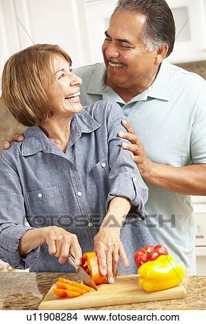Senior couple cooking View Large Photo Image Picture - Senior couple cooking. Fotosearch