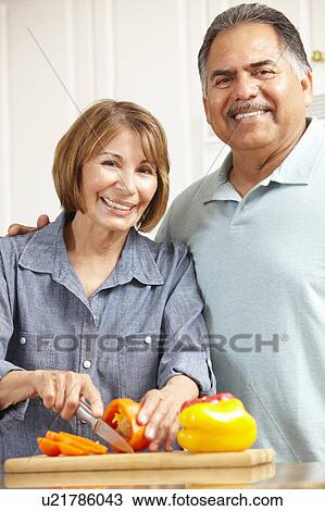 Senior couple cooking View Large Photo Image Stock Image - Senior couple cooking. Fotosearch