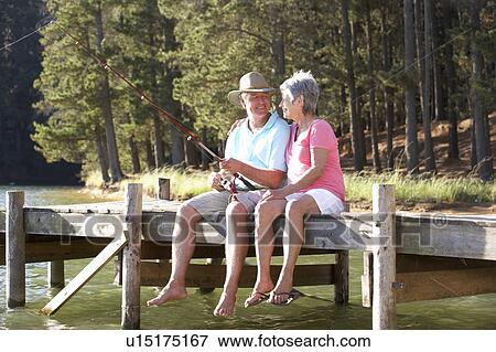 Stock Photo - Senior couple fishing. Fotosearch