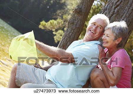 Senior couple fishing together View Large Photo Image Stock Image - Senior couple fishing together. Fotosearch