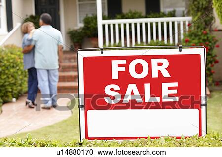 Senior Hispanic couple moving into new home View Large Photo Image Stock Image - Senior Hispanic couple moving into new home. Fotosearch