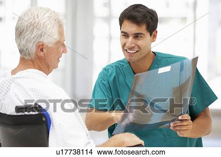 Senior patient with young doctor View Large Photo Image Picture - Senior patient with young doctor. Fotosearch