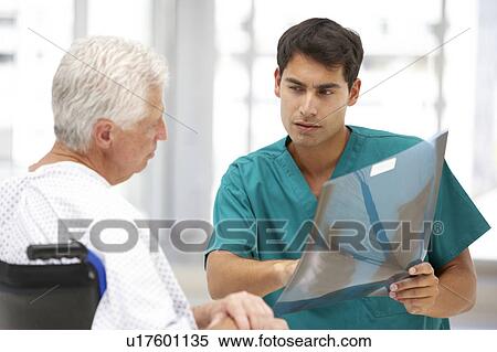 Senior patient with young doctor View Large Photo Image Stock Photography - Senior patient with young doctor. Fotosearch