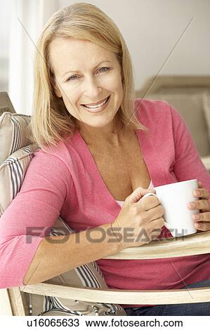 Stock Image - Senior woman at home. Fotosearch
