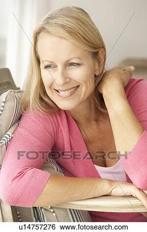 Senior woman at home View Large Photo Image Stock Photograph - Senior woman at home. Fotosearch