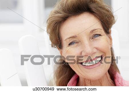 Stock Photo - Senior woman head and shoulders. Fotosearch