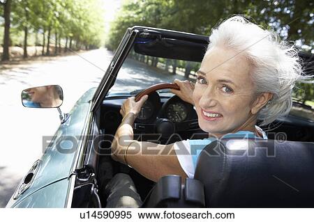 Senior woman in sports car View Large Photo Image Stock Photography - Senior woman in sports car. Fotosearch