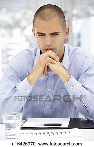 Serious young businessman View Large Photo Image Stock Image - Serious young businessman. Fotosearch