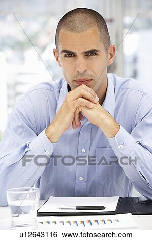 Serious young businessman View Large Photo Image Stock Photograph - Serious young businessman. Fotosearch