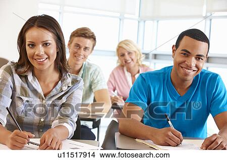 Picture - Students working in classroom. Fotosearch