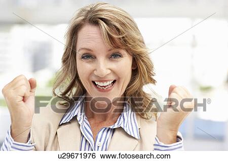 Stock Photograph - Successful mid age businesswoman. Fotosearch