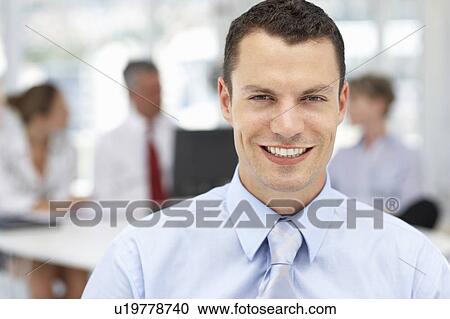 Stock Image - Successful young businessman. Fotosearch