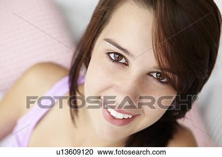 Stock Image - Teenage girl head and shoulders. Fotosearch