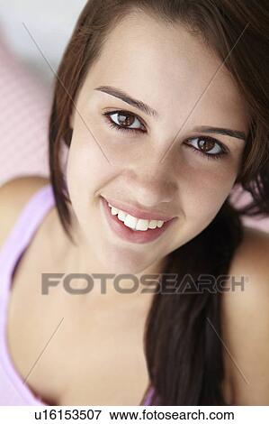Stock Photo - Teenage girl head and shoulders. Fotosearch