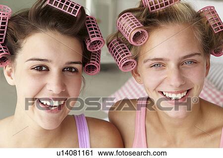 Teenage girls with hair in curlers View Large Photo Image Stock Image - Teenage girls with hair in curlers. Fotosearch