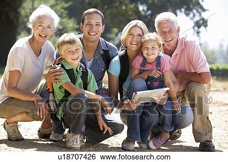 Three generation family on country walk View Large Photo Image Stock Photograph - Three generation family on country walk. Fotosearch