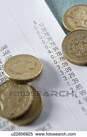 Till receipt and coins View Large Photo Image Stock Photography - Till receipt and coins. Fotosearch