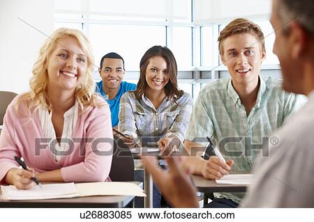 Tutor with class of students View Large Photo Image Stock Photography - Tutor with class of students. Fotosearch