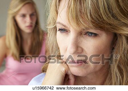Unhappy mother with teenage girl View Large Photo Image Stock Image - Unhappy mother with teenage girl. Fotosearch