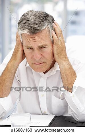 Unhappy senior businessman View Large Photo Image Stock Image - Unhappy senior businessman. Fotosearch