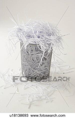 Waste bin full of shredding View Large Photo Image Stock Image - Waste bin full of shredding. Fotosearch