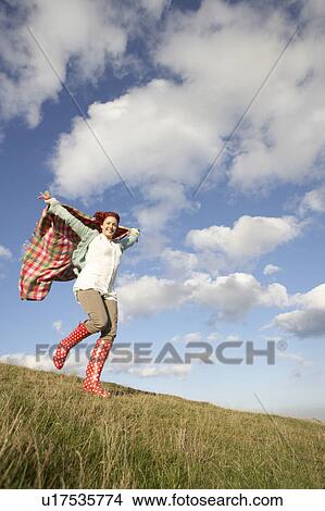 Woman in countryside View Large Photo Image Picture - Woman in countryside. Fotosearch