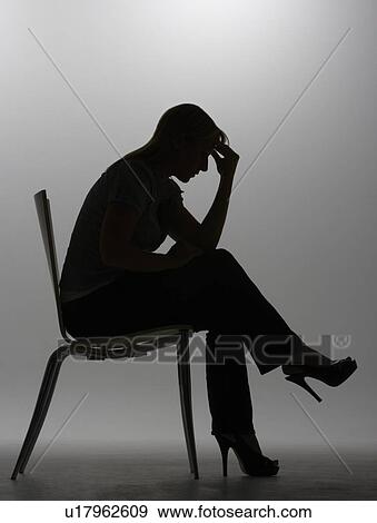 Stock Photo - Woman in silhouette. Fotosearch