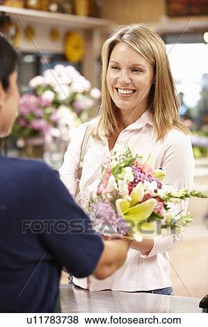 Woman shopping in florist View Large Photo Image Stock Photo - Woman shopping in florist. Fotosearch