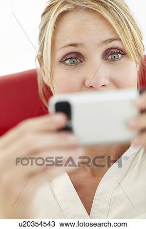 Woman texting View Large Photo Image Stock Image - Woman texting. Fotosearch
