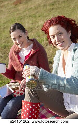 Stock Image - Women on country picnic. Fotosearch