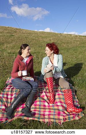 Women on country picnic View Large Photo Image Stock Photo - Women on country picnic. Fotosearch