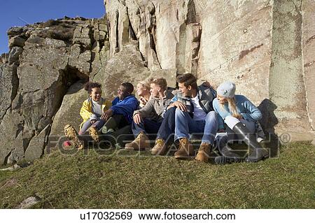 Stock Photo - Young adults in countryside. Fotosearch