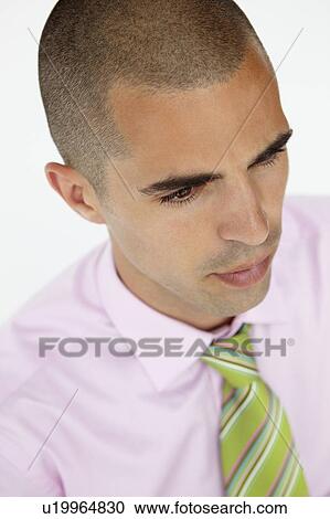 Stock Image - Young businessman head and shoulders. Fotosearch