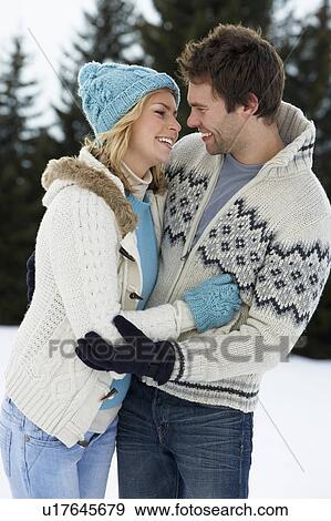 Young Couple In Alpine Snow Scene View Large Photo Image Stock Photo - Young Couple In Alpine Snow Scene. Fotosearch